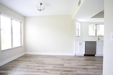 COMPLETELY RENOVATED Gated Golf Cmty - 3BR/2BA END UNIT | 128-B on The Club At Pelican Bay - North Course in Florida - for sale on GolfHomes.com, golf home, golf lot