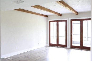 COMPLETELY RENOVATED Gated Golf Cmty - 3BR/2BA END UNIT | 128-B on The Club At Pelican Bay - North Course in Florida - for sale on GolfHomes.com, golf home, golf lot