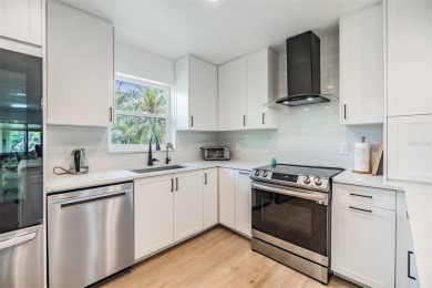 Don't miss out on a rare opportunity to own this GROUND FLOOR on Tarpon Woods Golf Club in Florida - for sale on GolfHomes.com, golf home, golf lot