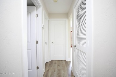 COMPLETELY RENOVATED Gated Golf Cmty - 3BR/2BA END UNIT | 128-B on The Club At Pelican Bay - North Course in Florida - for sale on GolfHomes.com, golf home, golf lot