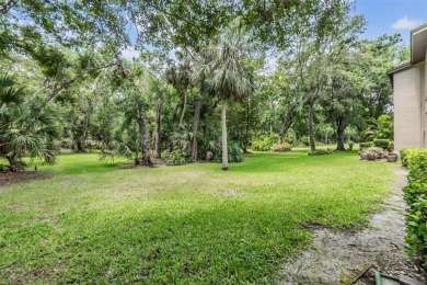Don't miss out on a rare opportunity to own this GROUND FLOOR on Tarpon Woods Golf Club in Florida - for sale on GolfHomes.com, golf home, golf lot