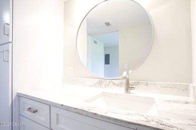 COMPLETELY RENOVATED Gated Golf Cmty - 3BR/2BA END UNIT | 128-B on The Club At Pelican Bay - North Course in Florida - for sale on GolfHomes.com, golf home, golf lot