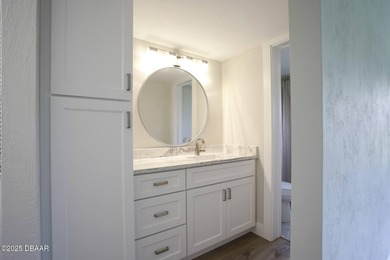 COMPLETELY RENOVATED Gated Golf Cmty - 3BR/2BA END UNIT | 128-B on The Club At Pelican Bay - North Course in Florida - for sale on GolfHomes.com, golf home, golf lot