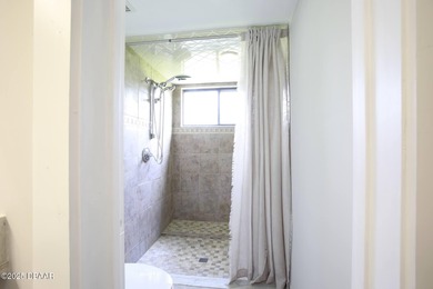 COMPLETELY RENOVATED Gated Golf Cmty - 3BR/2BA END UNIT | 128-B on The Club At Pelican Bay - North Course in Florida - for sale on GolfHomes.com, golf home, golf lot