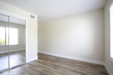 COMPLETELY RENOVATED Gated Golf Cmty - 3BR/2BA END UNIT | 128-B on The Club At Pelican Bay - North Course in Florida - for sale on GolfHomes.com, golf home, golf lot