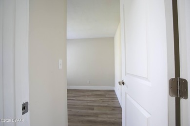 COMPLETELY RENOVATED Gated Golf Cmty - 3BR/2BA END UNIT | 128-B on The Club At Pelican Bay - North Course in Florida - for sale on GolfHomes.com, golf home, golf lot