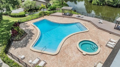 Don't miss out on a rare opportunity to own this GROUND FLOOR on Tarpon Woods Golf Club in Florida - for sale on GolfHomes.com, golf home, golf lot