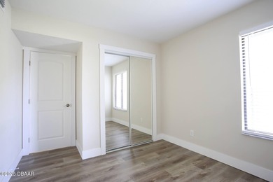 COMPLETELY RENOVATED Gated Golf Cmty - 3BR/2BA END UNIT | 128-B on The Club At Pelican Bay - North Course in Florida - for sale on GolfHomes.com, golf home, golf lot