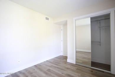 COMPLETELY RENOVATED Gated Golf Cmty - 3BR/2BA END UNIT | 128-B on The Club At Pelican Bay - North Course in Florida - for sale on GolfHomes.com, golf home, golf lot