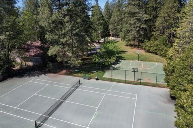 Nestled in the serene embrace of nature, this exquisite home in on Forest Meadows Golf Course in California - for sale on GolfHomes.com, golf home, golf lot