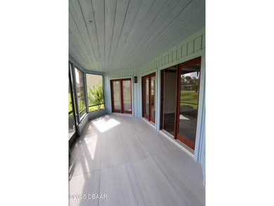 COMPLETELY RENOVATED Gated Golf Cmty - 3BR/2BA END UNIT | 128-B on The Club At Pelican Bay - North Course in Florida - for sale on GolfHomes.com, golf home, golf lot