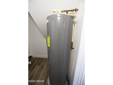 COMPLETELY RENOVATED Gated Golf Cmty - 3BR/2BA END UNIT | 128-B on The Club At Pelican Bay - North Course in Florida - for sale on GolfHomes.com, golf home, golf lot