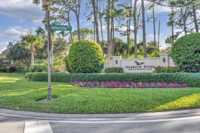 This Stunning 3 Bedroom, 2.5 Bathroom Home is Nestled in the on Harbour Ridge Yacht and Country Club in Florida - for sale on GolfHomes.com, golf home, golf lot