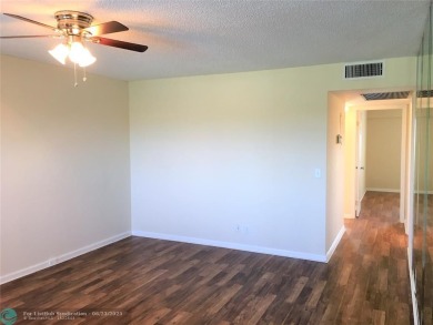 LOOK NO FURTHER! CAN BE RENTED RIGHT AWAY. THIS VERY CLEAN TOP on Flamingo Lakes Country Club in Florida - for sale on GolfHomes.com, golf home, golf lot