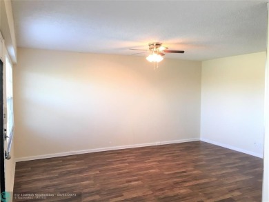 LOOK NO FURTHER! CAN BE RENTED RIGHT AWAY. THIS VERY CLEAN TOP on Flamingo Lakes Country Club in Florida - for sale on GolfHomes.com, golf home, golf lot