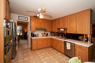 Amazing Neighborhood! Brick 4 Bedroom 2.5 Bath Golf Course Home on Shalimar Pointe Golf and Country Club in Florida - for sale on GolfHomes.com, golf home, golf lot