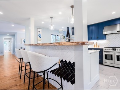 Double lot premium, move-in ready Landings home recently on The Landings Club - Palmetto in Georgia - for sale on GolfHomes.com, golf home, golf lot