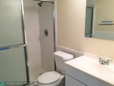 LOOK NO FURTHER! CAN BE RENTED RIGHT AWAY. THIS VERY CLEAN TOP on Flamingo Lakes Country Club in Florida - for sale on GolfHomes.com, golf home, golf lot