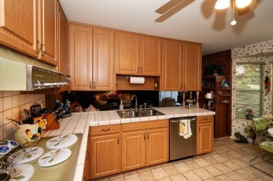 Amazing Neighborhood! Brick 4 Bedroom 2.5 Bath Golf Course Home on Shalimar Pointe Golf and Country Club in Florida - for sale on GolfHomes.com, golf home, golf lot