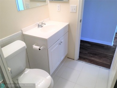 LOOK NO FURTHER! CAN BE RENTED RIGHT AWAY. THIS VERY CLEAN TOP on Flamingo Lakes Country Club in Florida - for sale on GolfHomes.com, golf home, golf lot