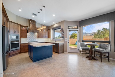 Perched atop a scenic hill in the prestigious Oro Valley Heights on Oro Valley Country Club in Arizona - for sale on GolfHomes.com, golf home, golf lot