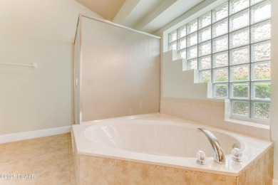 This is the one! As you arrive at this inviting 3BR, 2BA, open on Plantation Bay Golf and Country Club in Florida - for sale on GolfHomes.com, golf home, golf lot