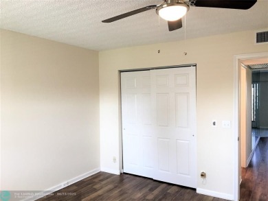 LOOK NO FURTHER! CAN BE RENTED RIGHT AWAY. THIS VERY CLEAN TOP on Flamingo Lakes Country Club in Florida - for sale on GolfHomes.com, golf home, golf lot