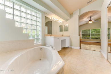 This is the one! As you arrive at this inviting 3BR, 2BA, open on Plantation Bay Golf and Country Club in Florida - for sale on GolfHomes.com, golf home, golf lot