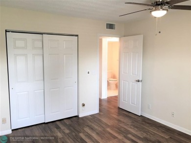 LOOK NO FURTHER! CAN BE RENTED RIGHT AWAY. THIS VERY CLEAN TOP on Flamingo Lakes Country Club in Florida - for sale on GolfHomes.com, golf home, golf lot