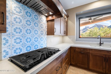 Perched atop a scenic hill in the prestigious Oro Valley Heights on Oro Valley Country Club in Arizona - for sale on GolfHomes.com, golf home, golf lot