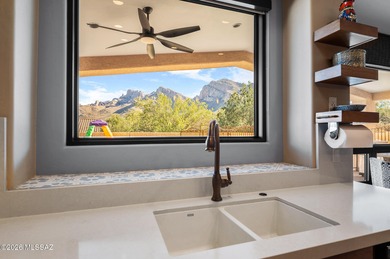 Perched atop a scenic hill in the prestigious Oro Valley Heights on Oro Valley Country Club in Arizona - for sale on GolfHomes.com, golf home, golf lot