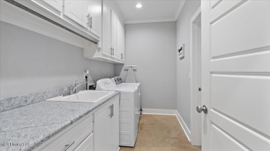 Immaculate 4 Bedrooms 2 bath home in Patrick Farms!  With almost on Patrick Farms Golf Club in Mississippi - for sale on GolfHomes.com, golf home, golf lot