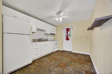 GREAT INCOME OPPORTUNITY IN ENGLEWOOD EAST! Duplex with each on Duffys Golf Center in Florida - for sale on GolfHomes.com, golf home, golf lot