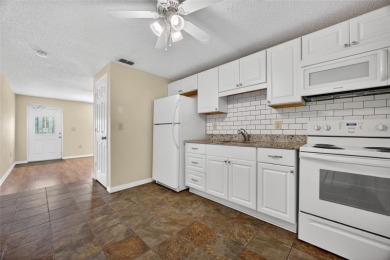 GREAT INCOME OPPORTUNITY IN ENGLEWOOD EAST! Duplex with each on Duffys Golf Center in Florida - for sale on GolfHomes.com, golf home, golf lot