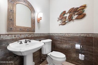 Perched atop a scenic hill in the prestigious Oro Valley Heights on Oro Valley Country Club in Arizona - for sale on GolfHomes.com, golf home, golf lot