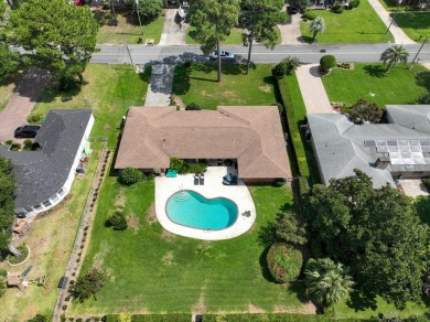 Amazing Neighborhood! Brick 4 Bedroom 2.5 Bath Golf Course Home on Shalimar Pointe Golf and Country Club in Florida - for sale on GolfHomes.com, golf home, golf lot