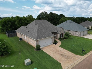 Immaculate 4 Bedrooms 2 bath home in Patrick Farms!  With almost on Patrick Farms Golf Club in Mississippi - for sale on GolfHomes.com, golf home, golf lot