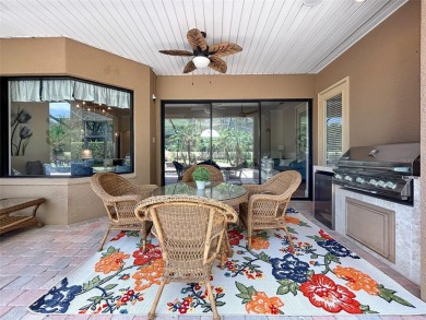 Lovely Meditterrean home welcomes you through rustic double on The Club at Eaglebrooke in Florida - for sale on GolfHomes.com, golf home, golf lot