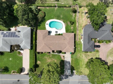 Amazing Neighborhood! Brick 4 Bedroom 2.5 Bath Golf Course Home on Shalimar Pointe Golf and Country Club in Florida - for sale on GolfHomes.com, golf home, golf lot