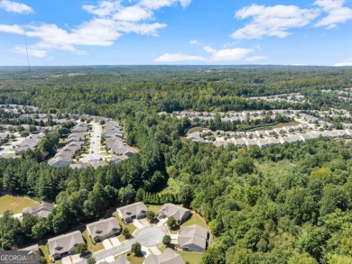 Stunning Show home in The Village at Deaton Creek with premium on Reunion Golf Club in Georgia - for sale on GolfHomes.com, golf home, golf lot