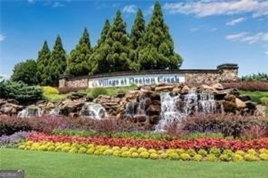 Stunning Show home in The Village at Deaton Creek with premium on Reunion Golf Club in Georgia - for sale on GolfHomes.com, golf home, golf lot