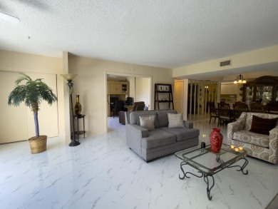 Wonderful first floor, seniors apartment with1650 Sqft, 3/2 on Poinciana Golf Club in Florida - for sale on GolfHomes.com, golf home, golf lot