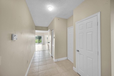 This spacious 3-bedroom, 2-bathroom with a lakeview balcony on Greenview Cove Golf Club in Florida - for sale on GolfHomes.com, golf home, golf lot