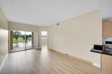 This spacious 3-bedroom, 2-bathroom with a lakeview balcony on Greenview Cove Golf Club in Florida - for sale on GolfHomes.com, golf home, golf lot