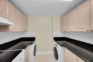 This spacious 3-bedroom, 2-bathroom with a lakeview balcony on Greenview Cove Golf Club in Florida - for sale on GolfHomes.com, golf home, golf lot