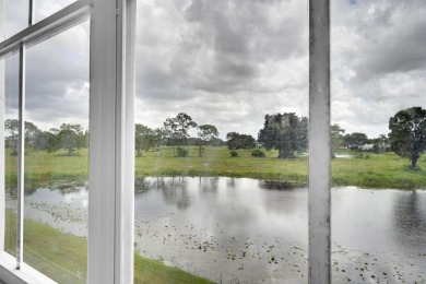 This spacious 3-bedroom, 2-bathroom with a lakeview balcony on Greenview Cove Golf Club in Florida - for sale on GolfHomes.com, golf home, golf lot