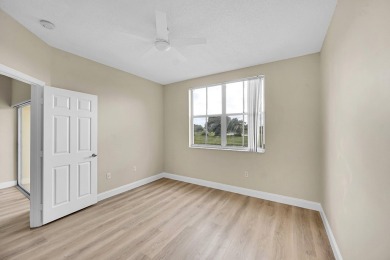 This spacious 3-bedroom, 2-bathroom with a lakeview balcony on Greenview Cove Golf Club in Florida - for sale on GolfHomes.com, golf home, golf lot