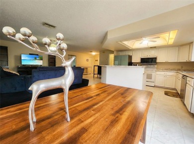 One or more photo(s) has been virtually staged. Main-level on Sugarmill Woods Golf and Country Club in Florida - for sale on GolfHomes.com, golf home, golf lot