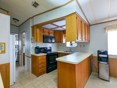 If you are looking for the perfect vacation, retirement or on The Great Outdoors Golf and Country Club in Florida - for sale on GolfHomes.com, golf home, golf lot