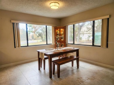 One or more photo(s) has been virtually staged. Main-level on Sugarmill Woods Golf and Country Club in Florida - for sale on GolfHomes.com, golf home, golf lot